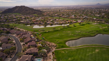 A aerial view of a desert golf course in the American southwest.