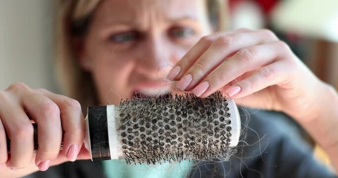 Woman is concerned about problem of hair loss and hormonal imbalance