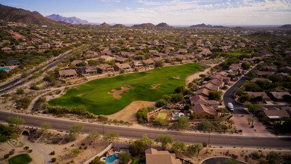 Obraz premium A aerial view of a golf course in the US southwest during the winter.