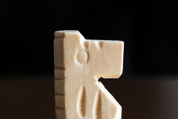 Closely focused chess piece. The white horse.