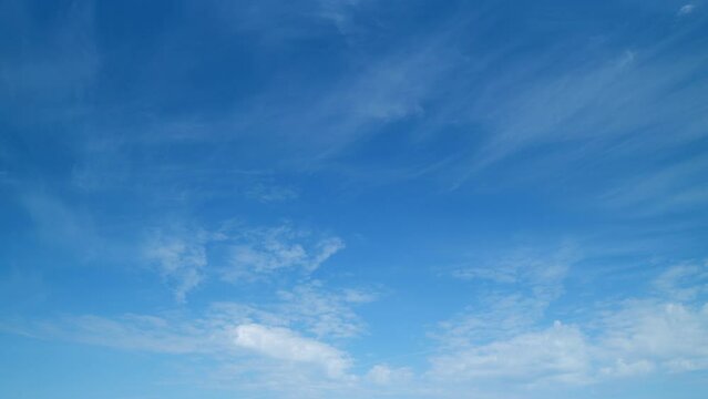 Sky after the storm. Majestic amazing blue sky with cirrus clouds. Nature clouds moving. Timelapse.
