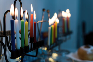 Low key image of jewish holiday Hanukkah background with menorah (traditional candelabra).