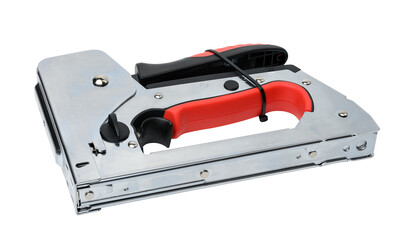 Manual metal stapler for staples and nails on a gray background