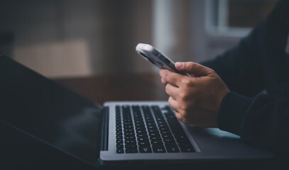 Businessman typing hands the laptop for the millennial project at home, online shopping and social networking, laptop device, and wireless technology concept, Student study business lifestyle