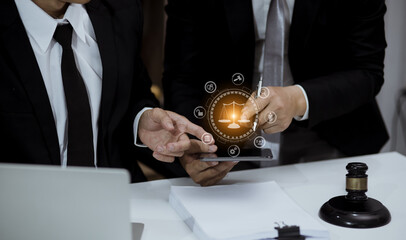 Statue of lady justice with scales of justice, Legal and law concept, law contract, Lawyer working at table in office.
