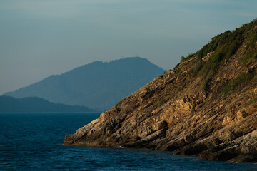 Naklejka premium Landscape of sunset seascape at Khao Laem Ya–Mu Ko Samet National Park, Rayong province, Thailand