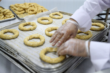 baker kneading dough