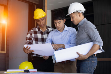 Construction and structure concept, engineer working, meeting for project working with partner on model building,