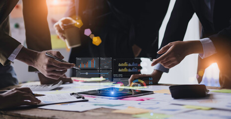 Technology and financial advisory services concert. Business teamwork and working on digital laptop computer with advisor showing plan of investment to clients at table office. Digital marketing.