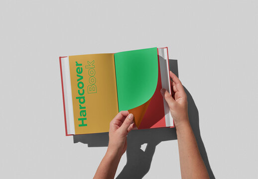 Turning Pages of a Hardcover Book Mockup With Custom Color Background