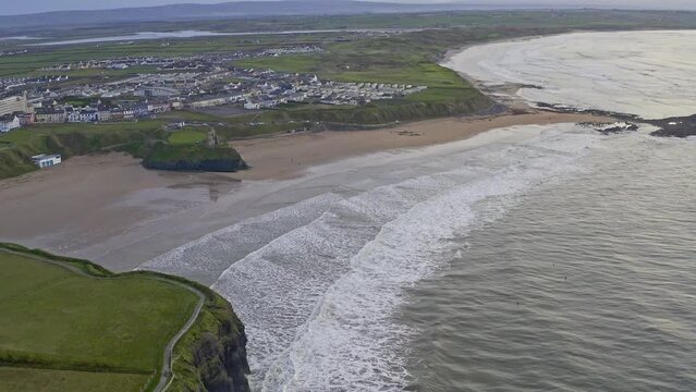 landscape of the Ballybunion Cliff Walk and rugged cliffs and seashore in County Kerry in western Ireland. High quality 4k footage