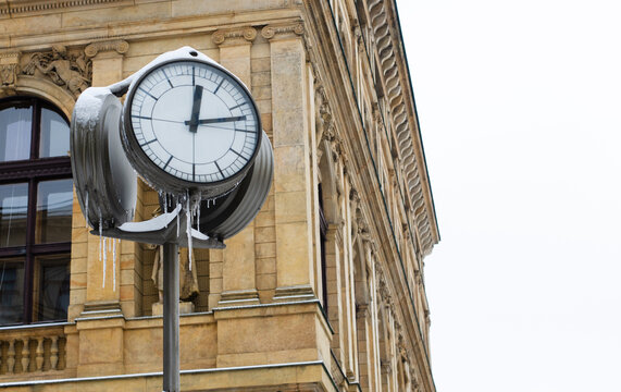 frozen street clock in Prague