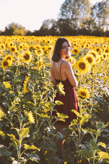 
portrait girl smile in sunflower field