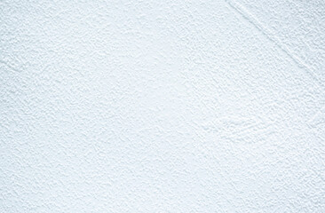 Light background of decorative plaster with abstract spots. Unusual texture of white or gray wall with beautiful patterns, creative surface background. Finishing coating for building cladding.