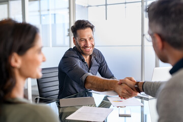 Businessman shaking hands with client