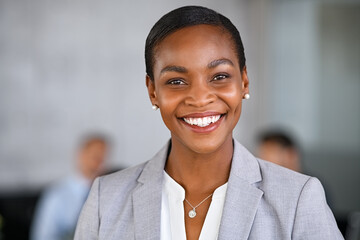 Successful mid adult black business woman looking at camera