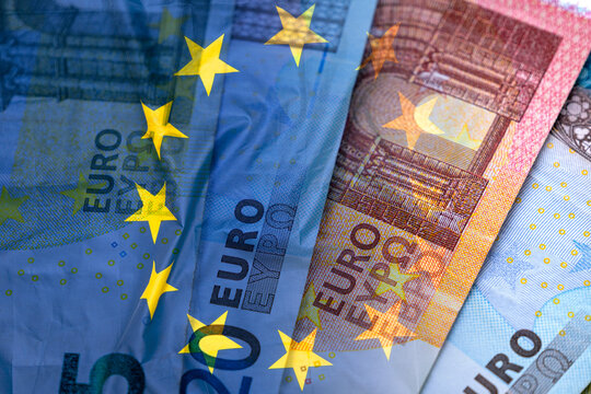 European union currency and flag of EU on surface, business concept picture