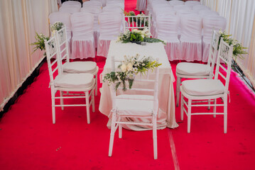 wedding ceremony table with fresh flower decoration and ready-to-use mic