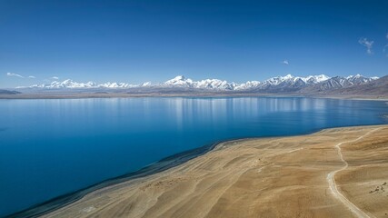 Beautiful shot of the Pekucuo lake and Shishapangma snowy mountains in Xigaze, China