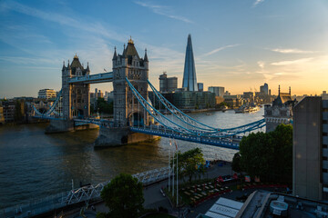 Elevated view of the famous Tower Bridge and skyline of London, UK, during beautiful sunset