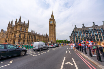Long exposure of the Houses of Parliament in London with blue sky seen from Westminster Bridge with...