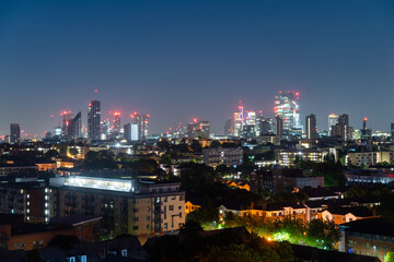 Fototapeta na wymiar Skyline View Of London Business District, Panoramic View At Night. London, Uk