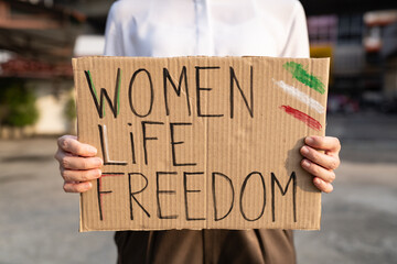 Woman protesting for women's rights in Iran - obrazy, fototapety, plakaty