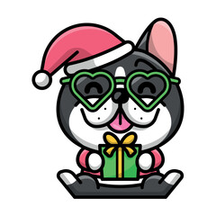 A CUTE FRENCH BULLDOG IS HOLDING A PRESENT BOX