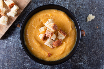 Pumpkin soup with croutons. Light and nutritious autumn dish, ideal for dinner.