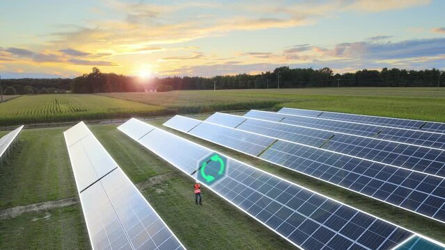 Sustainable production icons passing by while a engineer walks between solar panels - 3D render