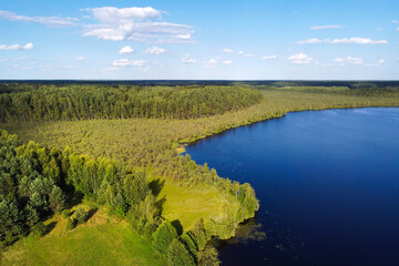 Obraz premium Aerial view of lake and forest. Summer lake, aerial landscape, beautiful nature