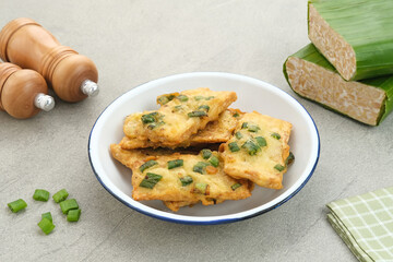 Tempe Mendoan, traditional fried tempeh, one of popular food from Indonesia.
