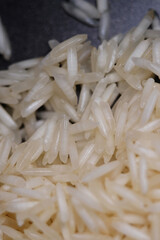 Macro texture of clean uncooked basmati rice 
