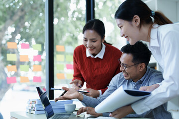 Asian entrepreneurs and business people meeting in a conference room in business planning, financial budget and investment risk assessment to analyze customer groups to increase company growth