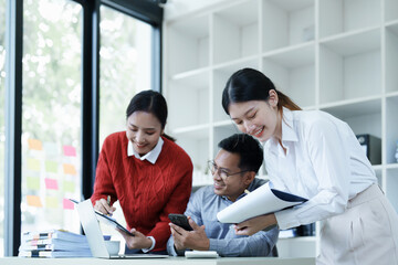 Asian entrepreneurs and business people meeting in a conference room in business planning, financial budget and investment risk assessment to analyze customer groups to increase company growth