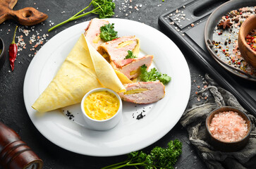 Chicken roll with bacon and asparagus. Restaurant dish. Menu. Top view.