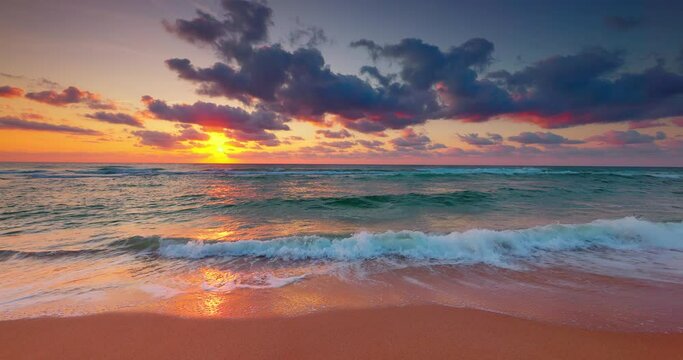 Beautiful morning over tropical beach. Ocean or sea sunrise with scenic clouds