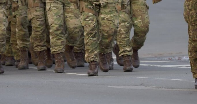 4K - A column of nato soldiers on a march