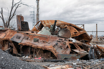 burnt tank and destroyed buildings of the Azovstal plant shop in Mariupol
