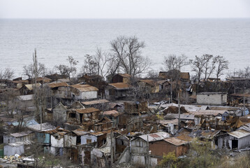destroyed and burned houses in the city Russia Ukraine war