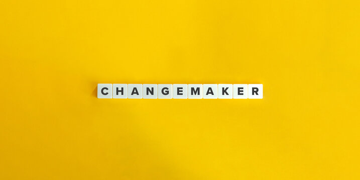 Changemaker Word and Banner. Letter Tiles on Yellow Background. Minimal Aesthetics.