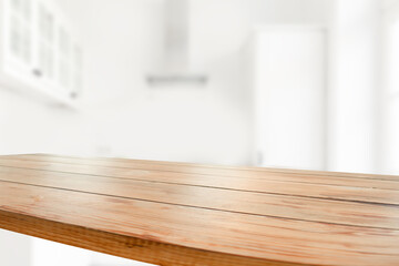empty wooden table on background of abstract blur white interior, montage, product display, inside and window.