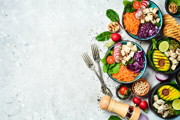 Set of detox Buddha bowl. Vegetarian food. The concept of healthy eating. On a stone background....