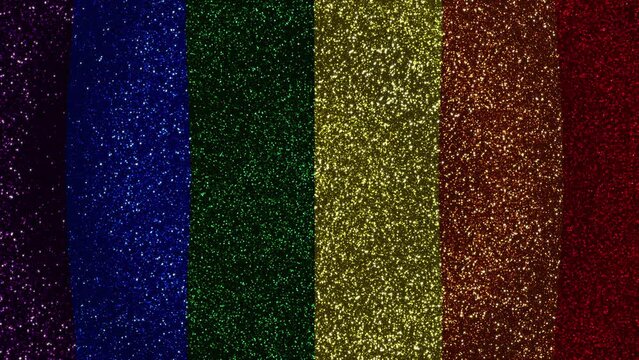 Rainbow colors glitter background wave pattern. lgbtq flag animation. 4k seamless loop