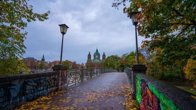 Isar river and St. Lukas Church, Munich, Germany sunset day to night timelapse 4K