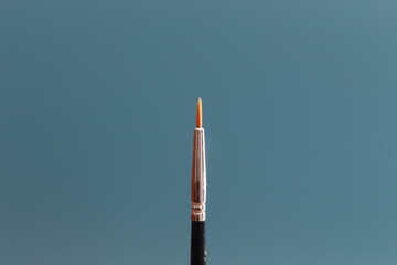 Naklejka premium a close up of a painting brush