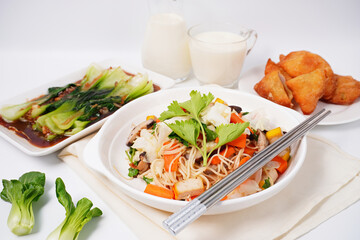 stir fried noodles vegetarian food  meatless on a white background