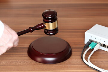 auction symbol with network and gavel on a wooden background - 549986348