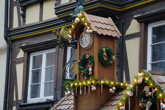 Cuckoo clock decorated in Christmas ornaments in the Christmas market in Bad Wimpfen town, Germany