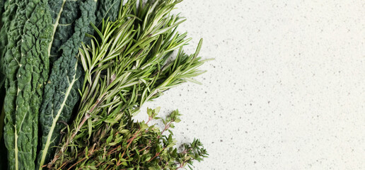 Black kale leaves, rosemary and thyme